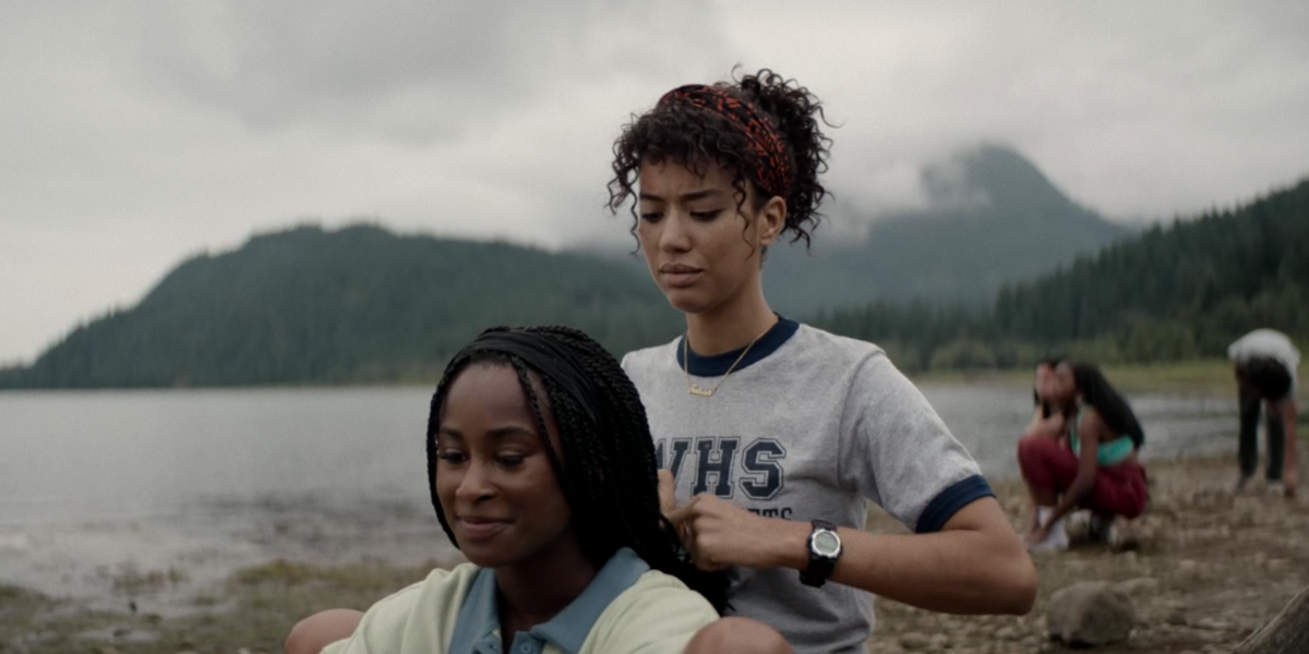 Yellowjackets 103 recap: Taissa doing Akilah's hair by a lake