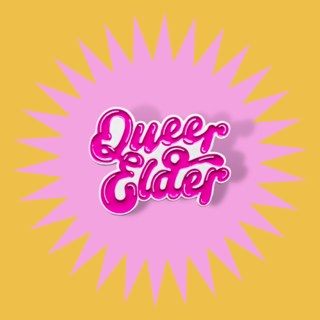 The words "Queer Elder" in bright pink cursive type. Soft enamel pin with white metal.