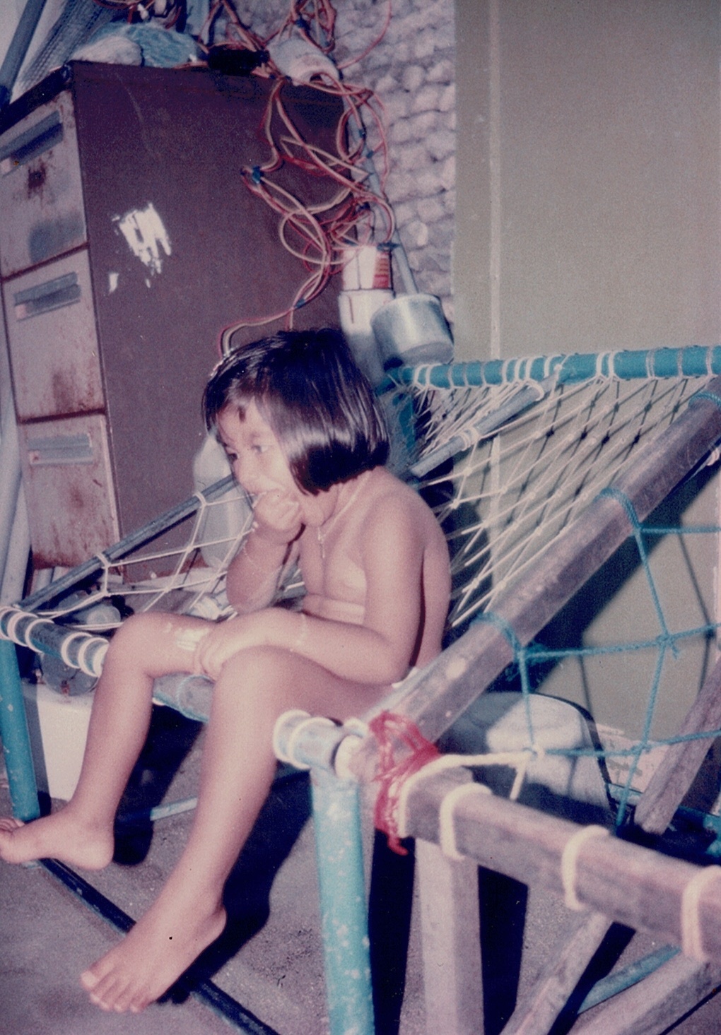 eman, the author, as a child in his mother's home in the Maldives