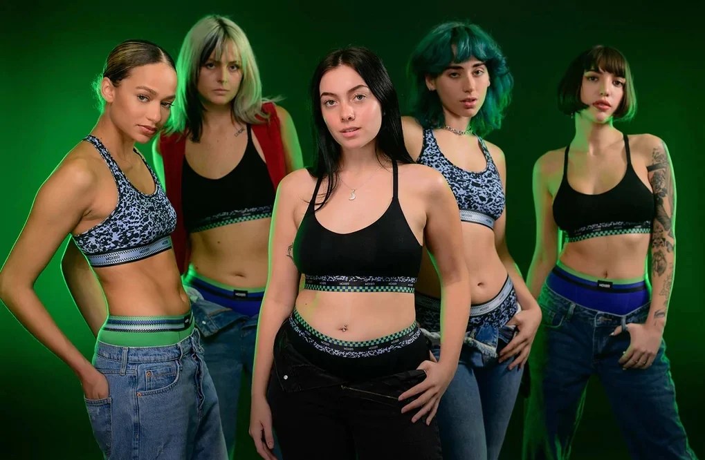 Five models in Woxers bras and pants sagging to show rim of boxer-briefs
