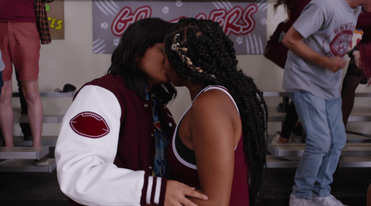 In Saved by the Bell, Aisha who is bisexual, kisses her girlfriend after the winning wrestling match.