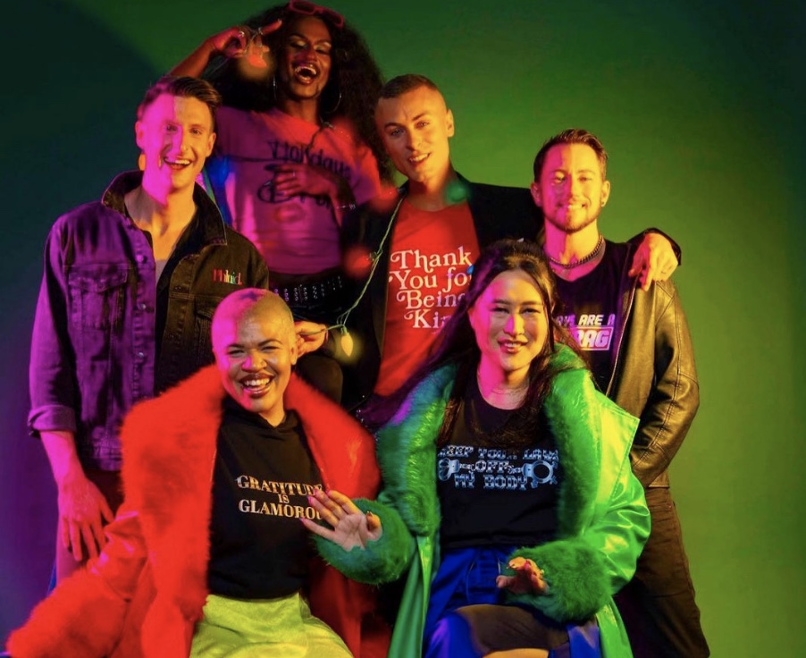 group of queer models in Christmassy Phluid Project apparel