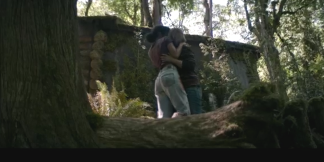 Yellowjackets 105 recap: a screenshot of Taissa and Van making out in the woods