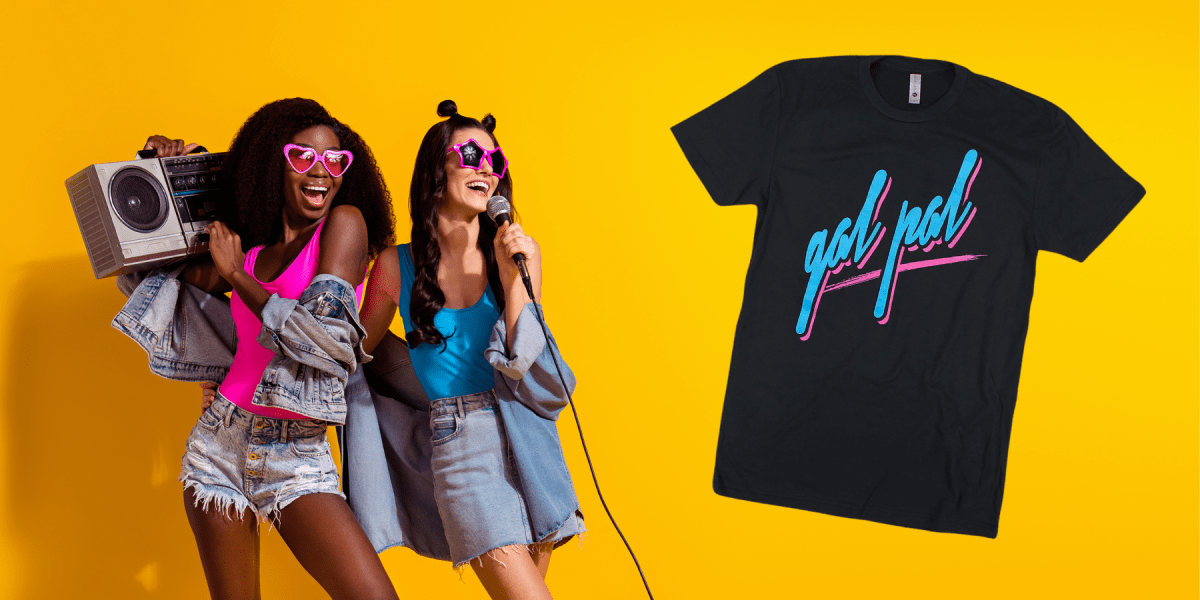 Two queers in denim and magenta and cyan with fun sunglasses with the GAL PAL shirt next to them.