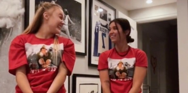 JoJo Siwa and Katie Mills smiling and laughing