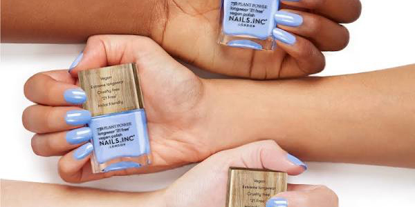 Three different skin tones where periwinkle nail polish from Plant Power vegan nails
