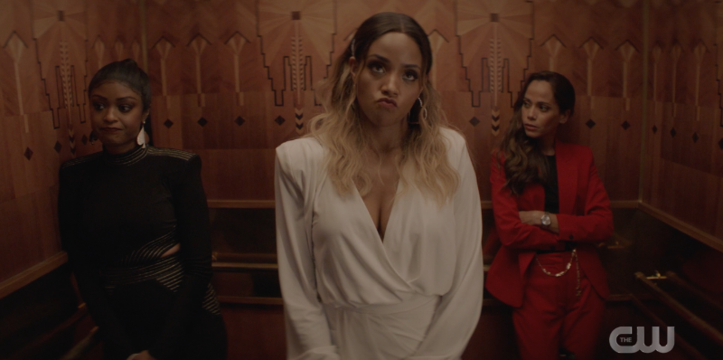 Ryan, Sophie, and Renee awkwardly stand in an elevator