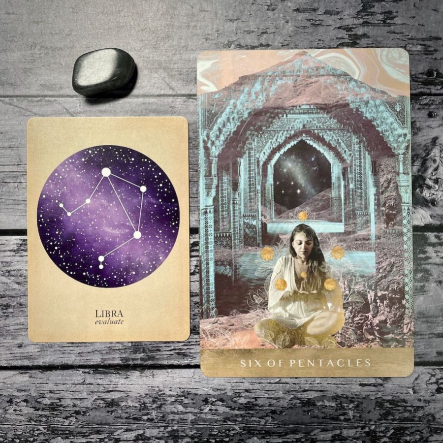A card says libra: evaluate with a purple circle, next to a card that says temperances with an illustration of women six of pentacles
