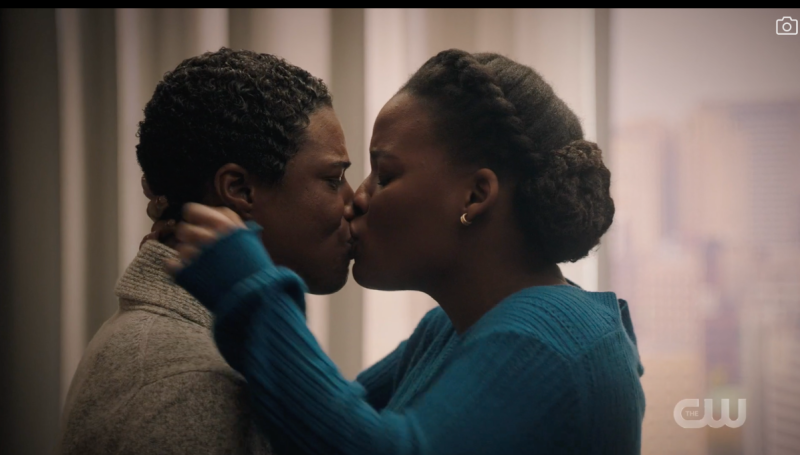 Shanice and Doc mid kiss while in a hotel room.
