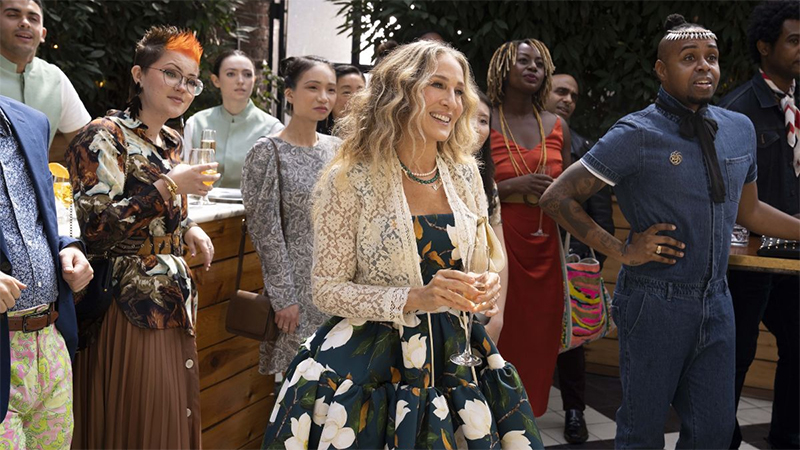 Carrie attends a wedding wearing a polka dot dress