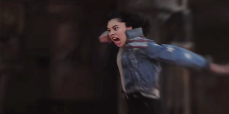 America Chavez leaps, yells, and punches