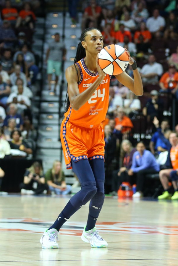 UNCASVILLE, CT - JULY 06: Connecticut Sun forward DeWanna Bonner (24) takes a three point shot during a WNBA game between Seattle Storm and Connecticut Sun on July 6, 2023, at Mohegan Sun Arena in Uncasville, CT. (Photo by M. Anthony Nesmith/Icon Sportswire via Getty Images)