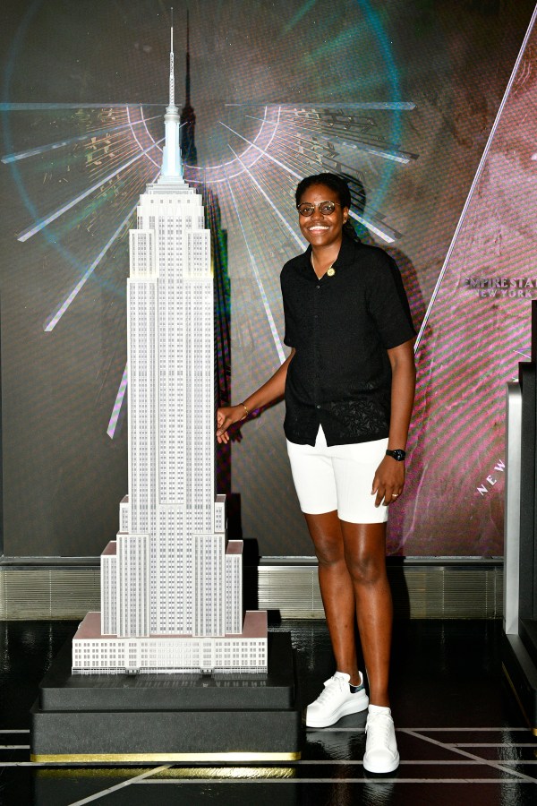 NEW YORK, NEW YORK - JULY 10: Jonquel Jones lights the Empire State Building in celebration of the 50th Anniversary of Bahamas' Independence on July 10, 2023 in New York City. (Photo by Eugene Gologursky/Getty Images for Empire State Realty Trust)