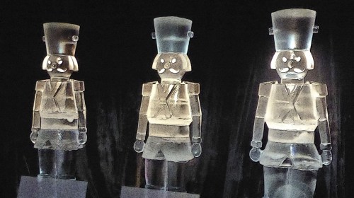 an ice sculpture of three toy soldiers