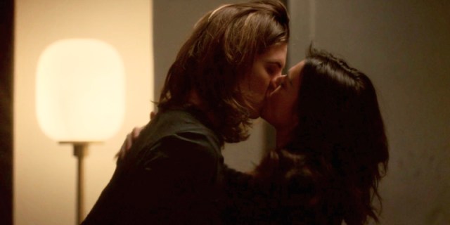 On Grey's Anatomy, Amelia and Kai make out while being backlight against a yellow lamp