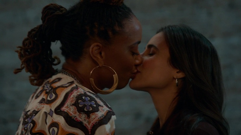 good trouble 401 recap: Malika kisses Angelica when she arrives at Dennis' food truck event.
