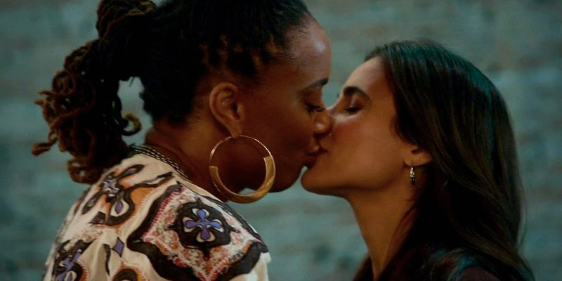 good trouble 401 recap: Malika kisses Angelica when she arrives at Dennis' food truck event.