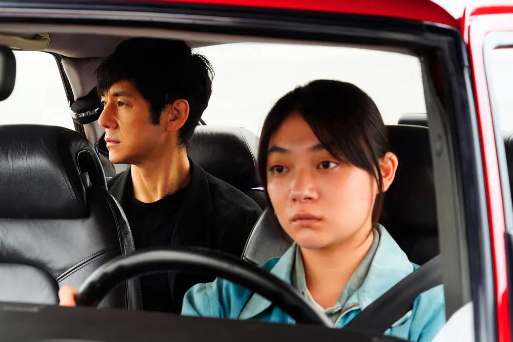Driver and passenger in 'Drive my Car"