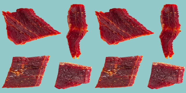 Beef jerky against a blue background
