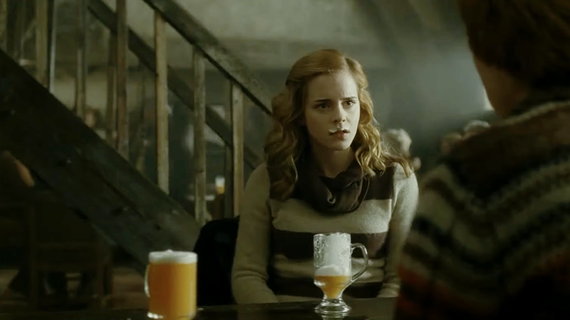 Hermione with Butterbeer on her lips