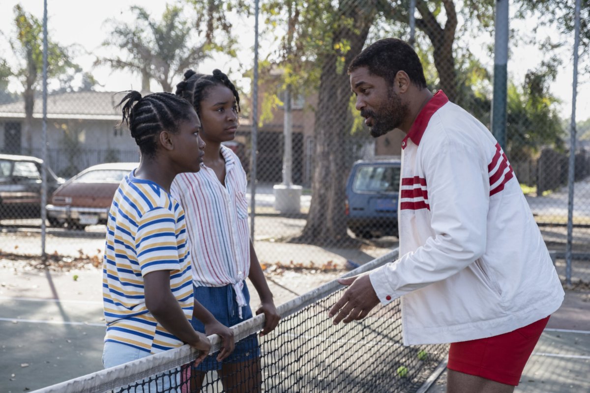 Demi Singleton as Serena, Saniyya Sidney as Venus and Will Smith as the future tennis stars’ father, Richard Williams, in “King Richard.”Credit...