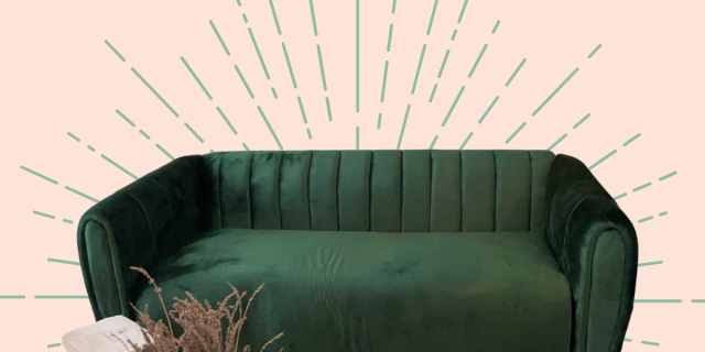An emerald green velvet couch against a peach background with light green lines emanating from it to give it a SHINE effect.