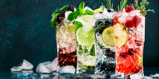Four chilly, ice-filled glasses of fruity mocktails