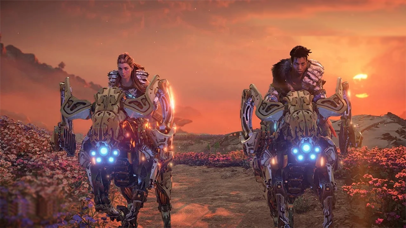 Varl and Aloy ride robotic chargers in the sunrise