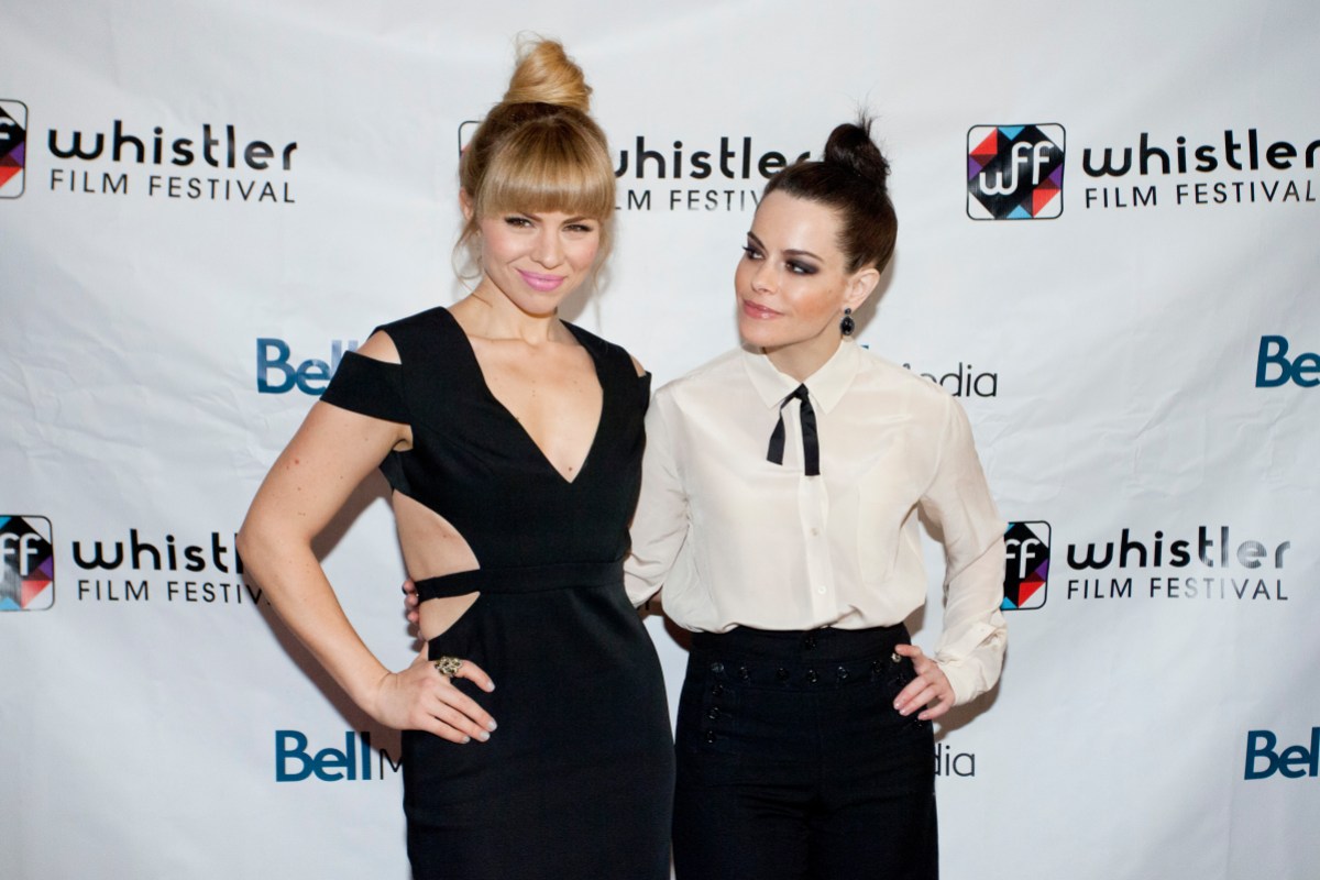 WHISTLER, BC - DECEMBER 05: Actors Ali Liebert (L) and Emily Hampshire arrive at the red carpet for the the 13th Annual Whistler Film Festival - Elle Canada Spotlight on Ali Liebert and Emily Hampshire hosted by Variety executive editor Steven Gaydos on December 5, 2013 in Whistler, Canada. (Photo by Phillip Chin/WireImage)