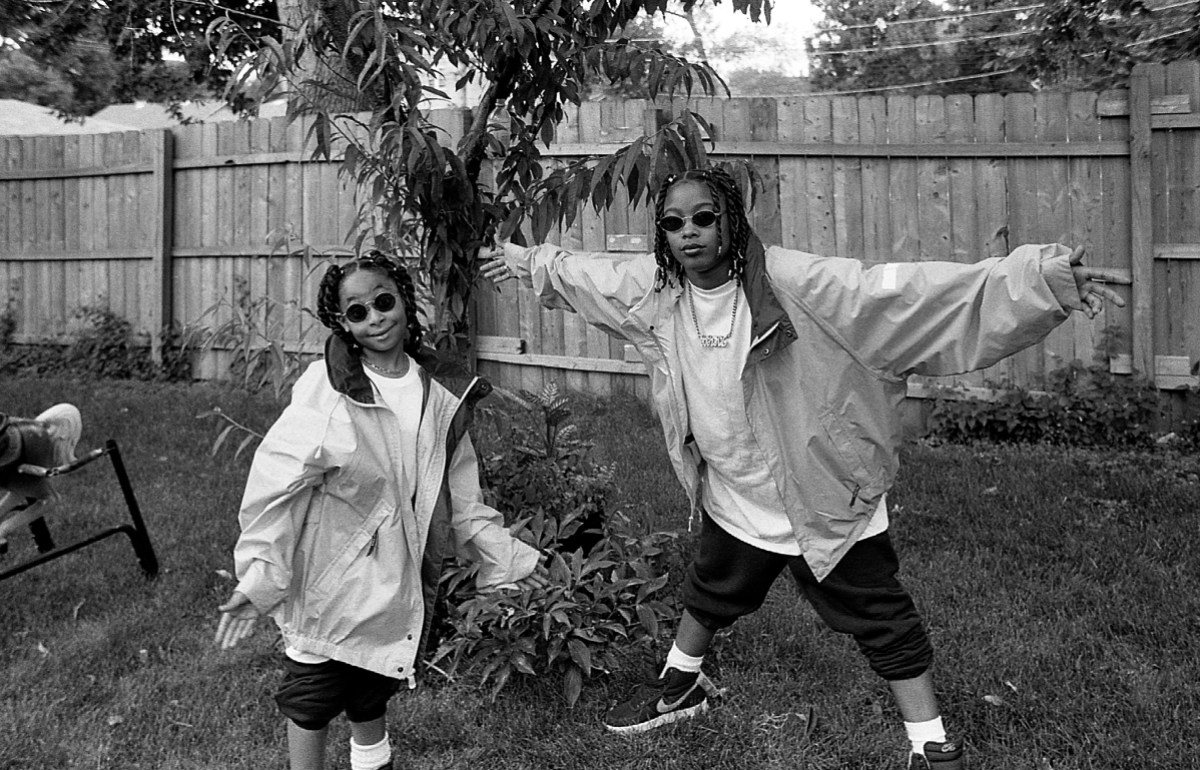 CHICAGO - JULY 1994: Actress Raven-Symoné and rapper Da Brat poses for photos during a break in filming Da Brat's video 'Fa All Y'all' on the West Side in Chicago, Illinois in July 1994. (Photo By Raymond Boyd/Getty Images)