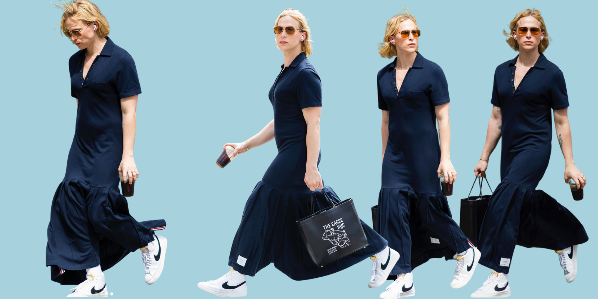 Four cut outs of Tommy Dorfman in a navy blue long t-shirt dress and clean white Nike's with a black swoosh. She has a blonde bob and oversized glasses. She's walking in each of the four cut outs, against a light blue background.