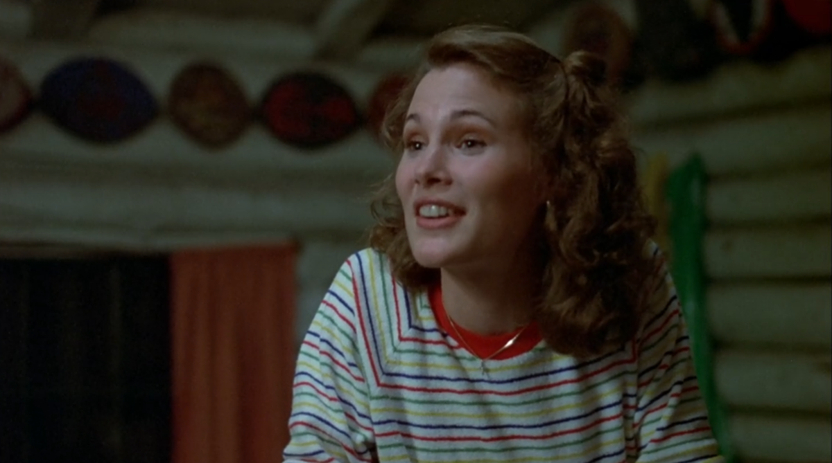 Brenda wears a colorful striped shirt in the movie Friday the 13th