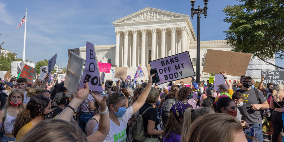 Picture of pro-abortion activists holding signs outside the Supreme Court in Washington D.C.