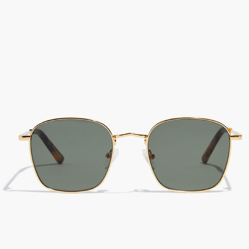 Thin wire gold framed sunglasses with square grey lenses in a close up.
