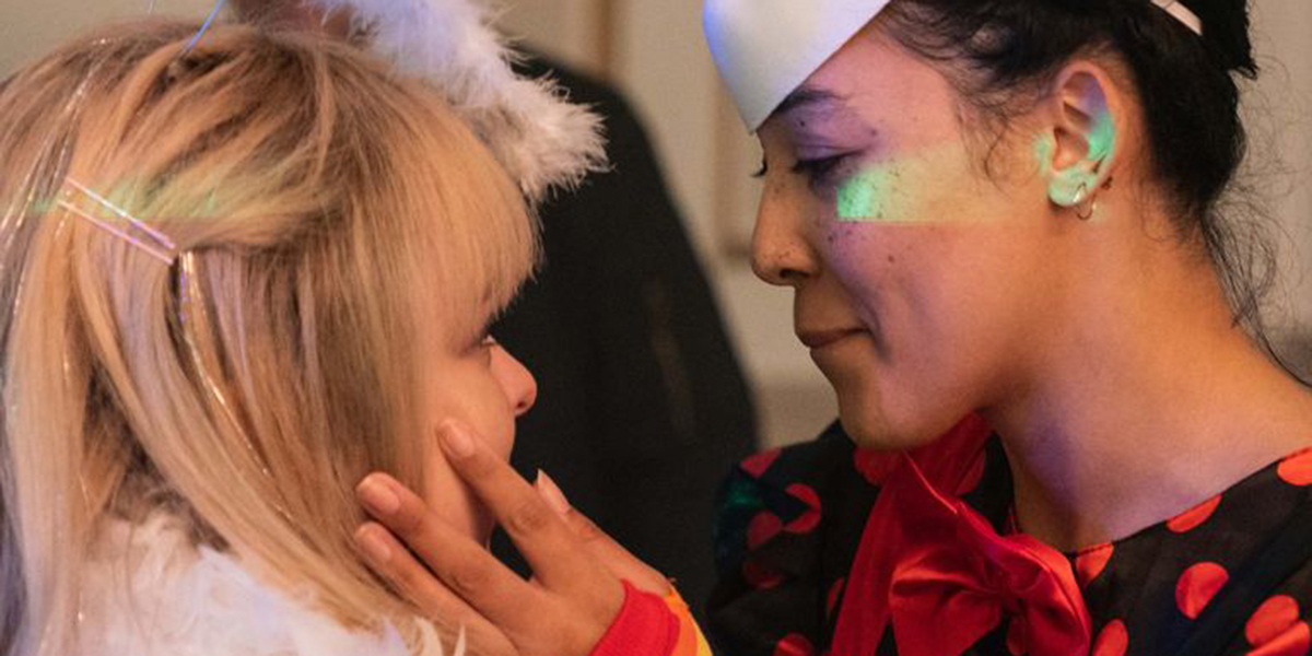 Laurie caresses Clare's face at the Fatboy Slim Halloween ball