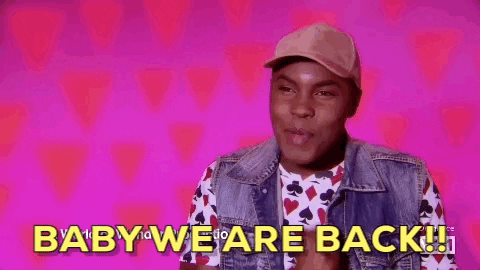 In a gif from RuPaul's Drag Race, a black gay man in tan baseball cap says "Baby We Are Back!!" in front of a pink background wall.