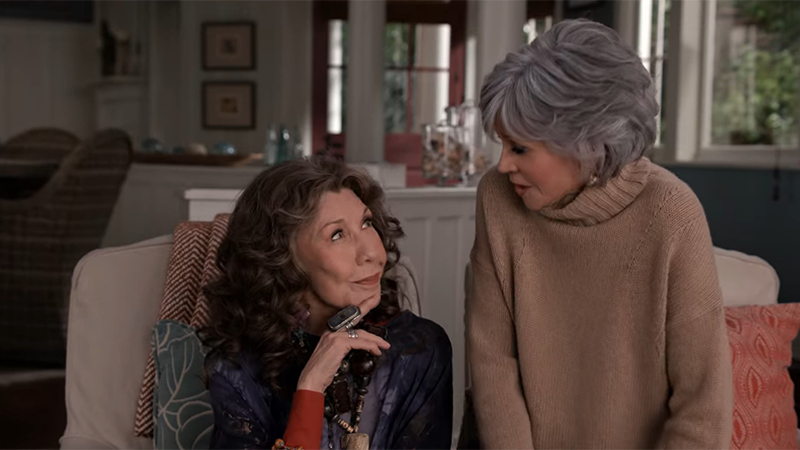 Grace and Frankie smile at each other