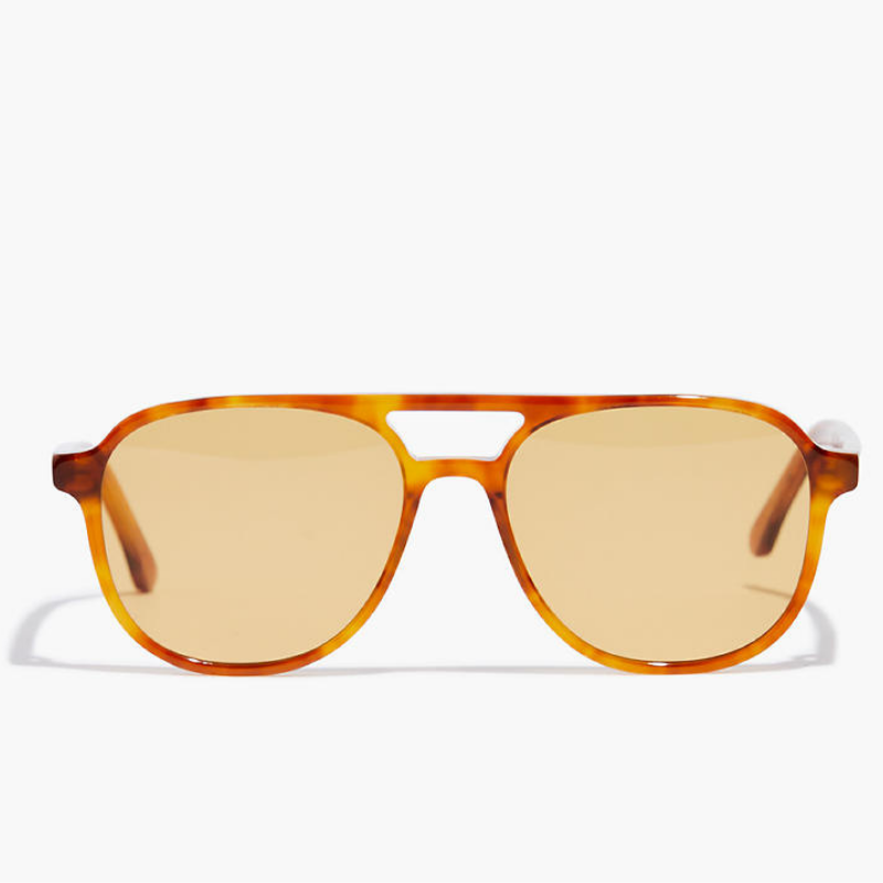Orange aviator sunglasses in a close up