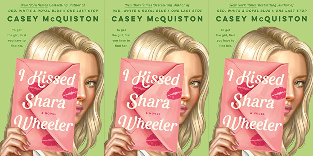 The cover of Casey McQuiston's I Kissed Shara Wheeler. A green background with a blonde girl holding a pink envelope with lipstick kisses on it.