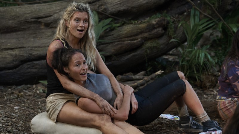 The Wilds: Shelby and Toni aka Shoni lie together and laugh at their friends