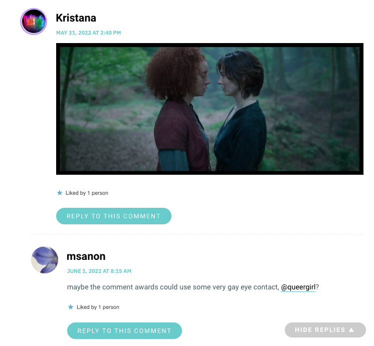 A screenshot of two women gazing at one another