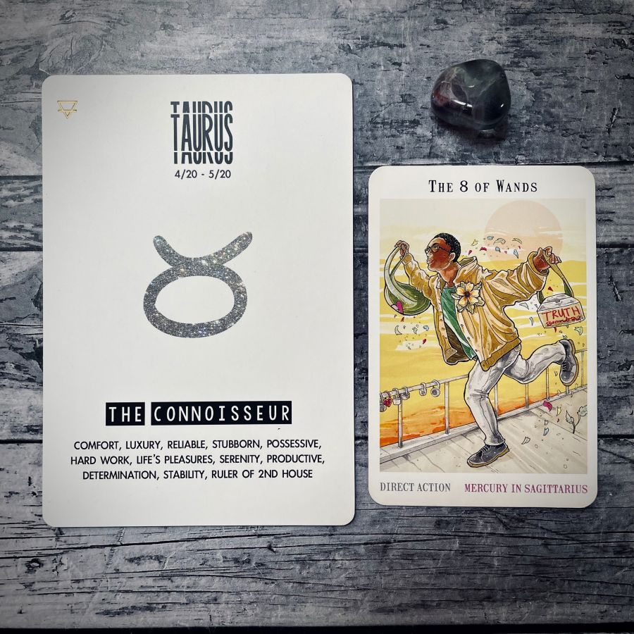 Left Card: Taurus, the connoisseur, COMFORT, LUXURY, RELIABLE, STUBBORN, POSSESSIVE,HARD WORK, LIFE'S PLEASURES, SERENITY, PRODUCTIVE, DETERMINATION, STABILITY, RULER OF 2ND HOUSE  Right Card: The 8 of wands is a drawing of a black femme person with short hair, glasses, and an oversized tan coat with a large flower over a green shirt and jeans. They are walking on the boardwalk with tote bags leaving flowers behind them, one bag says truth. Behind the boardwalk is a sunrise.  Underneath it says: direct action, mercury in sagittarius