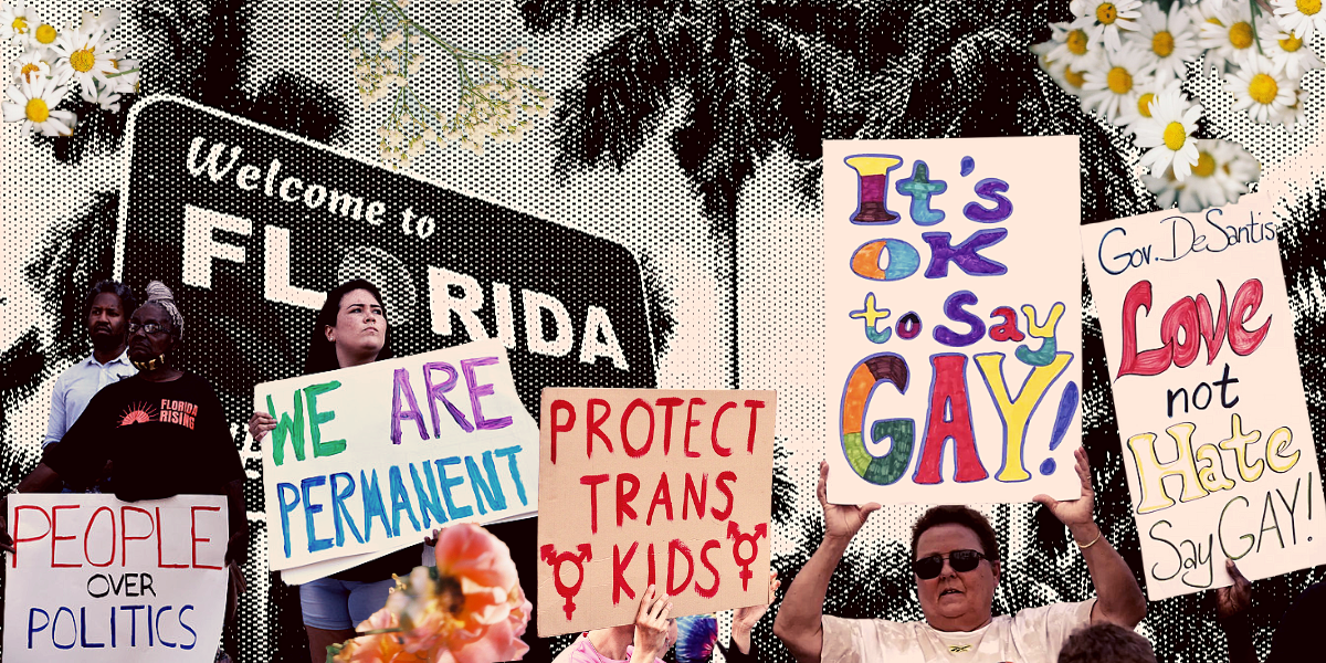 People hold protest signs with phrases like "Protect Trans Kids" and "It's OK To Say Gay" and "We Are Permanent" written on them against a background of a Welcome to Florida sign and a palm tree