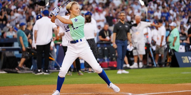 JoJo Siwa bats during the MGM All-Star Celebrity Softball Game at Dodger Stadium on Saturday, July 16, 2022 in Los Angeles, California.