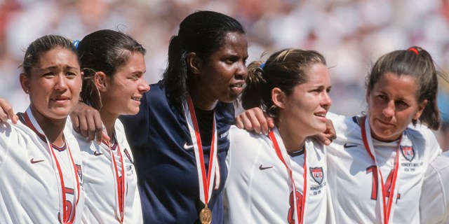 ULY 10: Tiffany Roberts #5, Mia Hamm #9, Briana Scurry #1, Shannon MacMillan #8, and Joy Fawcett #14 of the USA celebrate winning the 1999 FIFA Women's World Cup final played against China on July 10, 1999 at the Rose Bowl in Pasadena, California.