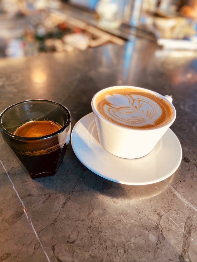 a shot of espresso and a beautiful coffee