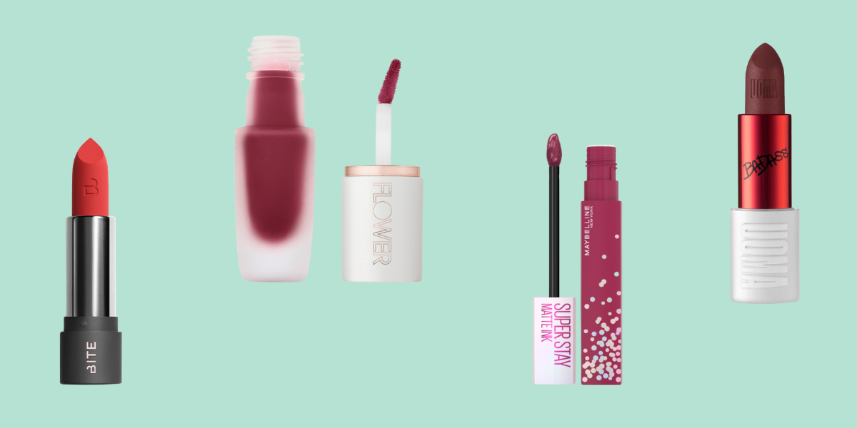 Four lipsticks in berry shades against a mint background