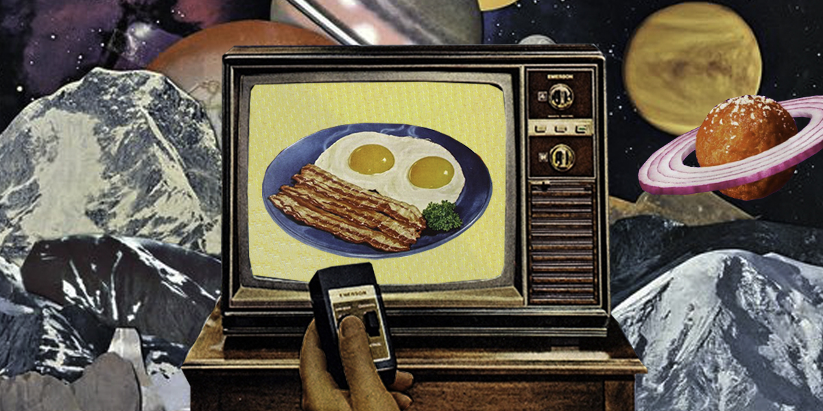 An old television screen shows an image of eggs and bacon. Behind it are planets and rock formations. There is a meatball with red onion for its rings, looking like Saturn. A hand holds a remote.