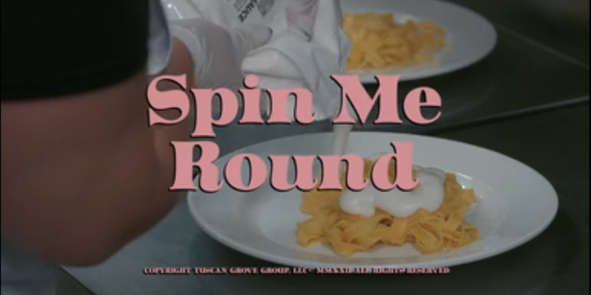 Spin Me Round Title Card