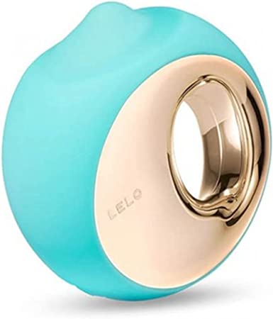 The Ora 3: A circular, teal, silicone sex toy with a gold plastic center has an opening to use as a handle. The word "LELO" appears on the left side of the gold plastic portion. On the top of the toy, there is a small protrusion, which is also covered by silicone.